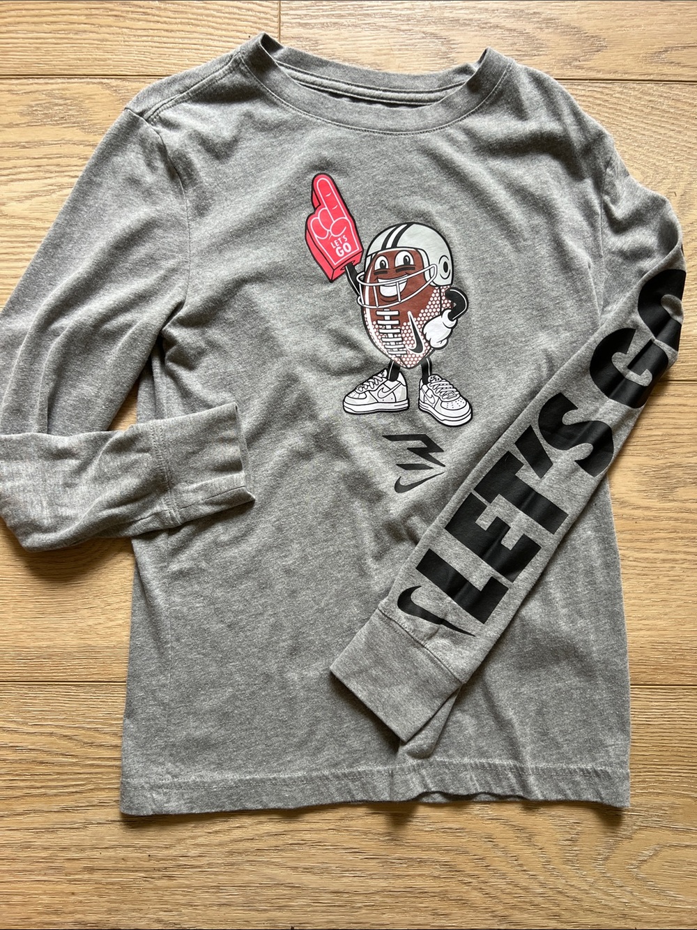 Nike Gray Long Sleeve Tee with Football Character Graphic
